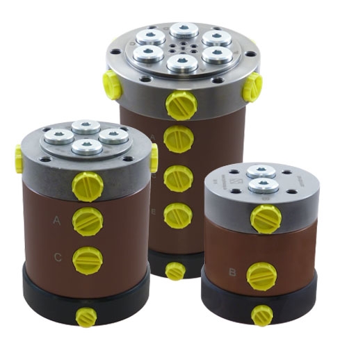 Rotary couplings, with leakage recirculation